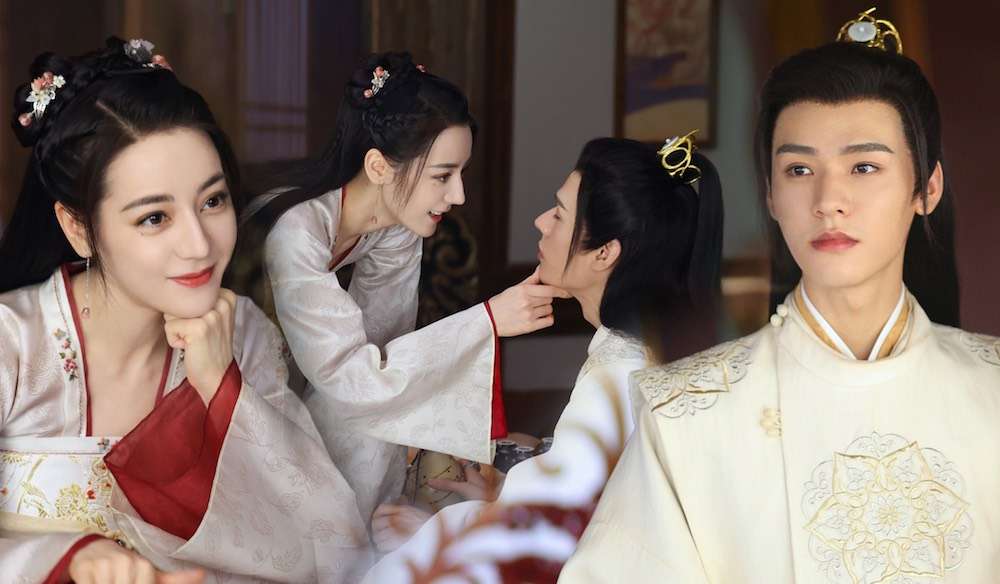 Cảnh phim An Lạc Truyện – Địch Lệ Nhiệt Ba và Cung Tuấn trong trang phục cổ trang, nhìn nhau đầy ẩn ý.